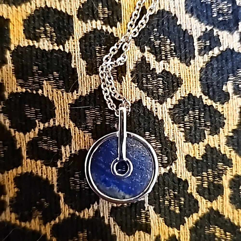 Lapis lazuli pendant in silvertone with stainless steel necklace 18 to 20 inches